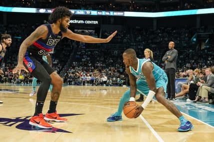 Oct 27, 2023; Charlotte, North Carolina, USA; Charlotte Hornets guard Terry Rozier (3) handles the ball against Detroit Pistons forward Marvin Bagley III (35) during the second quarter at Spectrum Center. Mandatory Credit: Jim Dedmon-USA TODAY Sports