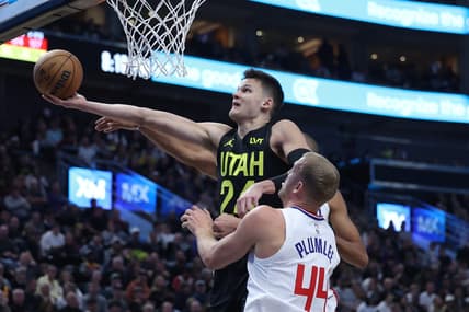 Oct 27, 2023; Salt Lake City, Utah, USA; Utah Jazz center Walker Kessler (24) goes to the basket against Los Angeles Clippers center Mason Plumlee (44) in the second quarter at Delta Center. Mandatory Credit: Rob Gray-USA TODAY Sports