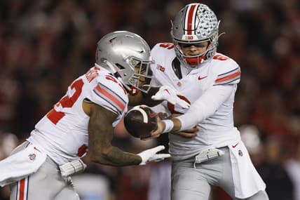 Oct 28, 2023; Madison, Wisconsin, USA;  Ohio State Buckeyes quarterback Kyle McCord (6) hands the football off to running back TreVeyon Henderson (32) during the third quarter against the Wisconsin Badgers at Camp Randall Stadium. Mandatory Credit: Jeff Hanisch-USA TODAY Sports