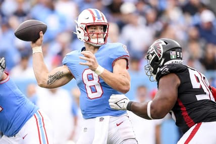 Oct 29, 2023; Nashville, Tennessee, USA; Tennessee Titans quarterback Will Levis (8) throws a pass just before getting hit by Atlanta Falcons defensive tackle David Onyemata (90) during the second half at Nissan Stadium. Mandatory Credit: Steve Roberts-USA TODAY Sports