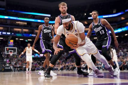 Oct 29, 2023; Sacramento, California, USA; Los Angeles Lakers forward Anthony Davis (3) falls to the ground after being fouled by Sacramento Kings forward Domantas Sabonis (10) in the second quarter at the Golden 1 Center. Mandatory Credit: Cary Edmondson-USA TODAY Sports