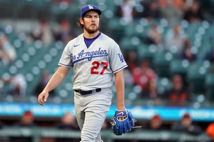 May 21, 2021; San Francisco, California, USA; Los Angeles Dodgers starting pitcher Trevor Bauer (27) walks to the dugout at the end of the first inning against the San Francisco Giants at Oracle Park. Mandatory Credit: Darren Yamashita-USA TODAY Sports