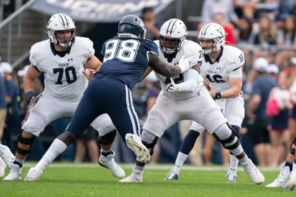 (File photo) Yale Bulldogs offensive lineman Kiran Amegadjie (72) blocks Connecticut Huskies defensive lineman Lwal Uguak (98) during the first half at Rentschler Field at Pratt & Whitney Stadium. Mandatory Credit: Gregory Fisher-USA TODAY Sports