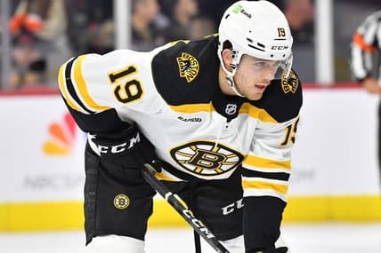 Sep 24, 2022; Philadelphia, Pennsylvania, USA; Boston Bruins center John Beecher (19) against the Philadelphia Flyers at Wells Fargo Center. Mandatory Credit: Eric Hartline-USA TODAY Sports