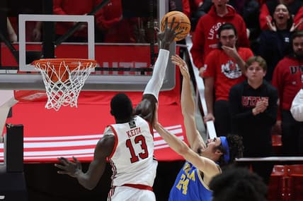 Feb 23, 2023; Salt Lake City, Utah, USA; Utah Utes center Keba Keita (13) blocks the shot of UCLA Bruins guard Jaime Jaquez Jr. (24) in the second half at Jon M. Huntsman Center. Mandatory Credit: Rob Gray-USA TODAY Sports
