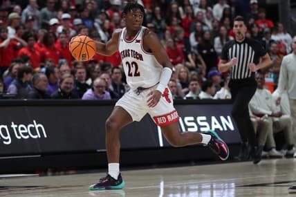 Feb 25, 2023; Lubbock, Texas, USA; Texas Tech Red Raiders guard Elijah Fisher (22) brings the ball up court against the TCU Horned Frogs in the second half at United Supermarkets Arena. Mandatory Credit: Michael C. Johnson-USA TODAY Sports