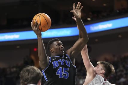 March 6, 2023; Las Vegas, NV, USA; Brigham Young Cougars forward Fousseyni Traore (45) shoots the basketball against Saint Mary's Gaels center Mitchell Saxen (11) during the second half in the semifinals of the WCC Basketball Championships at Orleans Arena. Mandatory Credit: Kyle Terada-USA TODAY Sports