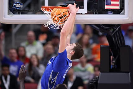 Mar 26, 2023; Louisville, KY, USA;  Creighton Bluejays center Ryan Kalkbrenner (11) dunks the ball during the second half against the San Diego State Aztecs at the NCAA Tournament South Regional-Creighton vs San Diego State at KFC YUM! Center. Mandatory Credit: Jordan Prather-USA TODAY Sports