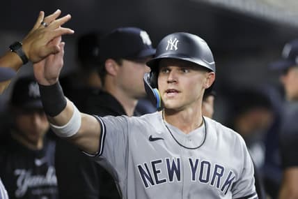 Aug 11, 2023; Miami, Florida, USA; New York Yankees first baseman Jake Bauers (61) celebrates after scoring against the Miami Marlins during the fourth inning at loanDepot Park. Mandatory Credit: Sam Navarro-USA TODAY Sports