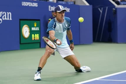 Sep 4, 2023; Flushing, NY, USA; Alex de Minaur of Australia hits to Daniil Medvedev on day eight of the 2023 U.S. Open tennis tournament at USTA Billie Jean King National Tennis Center. Mandatory Credit: Danielle Parhizkaran-USA TODAY Sports