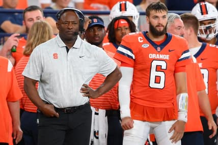 Sep 9, 2023; Syracuse, New York, USA; Syracuse Orange head coach Dino Babers (right) and quarterback Garrett Schrader (6) look on against the Western Michigan Broncos during the second half at the JMA Wireless Dome. Mandatory Credit: Rich Barnes-USA TODAY Sports