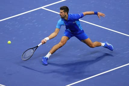 Sep 10, 2023; Flushing, NY, USA; Novak Djokovic of Serbia reaches for a forehand against Daniil Medvedev (not pictured) in the men's singles final in the men's singles final on day fourteen of the 2023 U.S. Open tennis tournament at USTA Billie Jean King National Tennis Center. Mandatory Credit: Danielle Parhizkaran-USA TODAY Sports