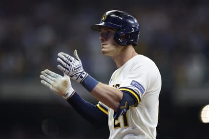 Oct 4, 2023; Milwaukee, Wisconsin, USA; Milwaukee Brewers player Mark Canha (21) reacts after hitting a single in the eighth inning against the Arizona Diamondbacks during game two of the Wildcard series for the 2023 MLB playoffs at American Family Field. Mandatory Credit: Kamil Krzaczynski-USA TODAY Sports