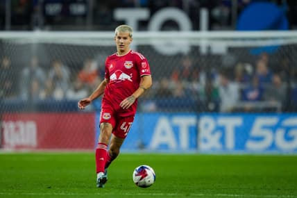 Oct 29, 2023; Cincinnati, OH, USA; New York Red Bulls defender John Tolkin (47) dribbles the ball against FC Cincinnati in the second half of game one in a round one match of the 2023 MLS Cup Playoffs at TQL Stadium. Mandatory Credit: Aaron Doster-USA TODAY Sports