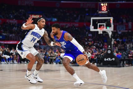 Oct 31, 2023; Los Angeles, California, USA; Los Angeles Clippers forward Paul George (13) moves the ball against during the first half at Crypto.com Arena. Mandatory Credit: Gary A. Vasquez-USA TODAY Sports