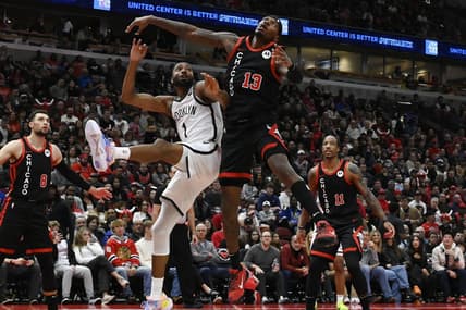 Nov 3, 2023; Chicago, Illinois, USA; Chicago Bulls forward Torrey Craig (13) defends against a shot by Brooklyn Nets forward Mikal Bridges (1) during the first half at the United Center. Mandatory Credit: Matt Marton-USA TODAY Sports