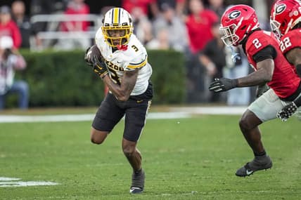Nov 4, 2023; Athens, Georgia, USA; Missouri Tigers wide receiver Luther Burden III (3) runs against Georgia Bulldogs linebacker Smael Mondon Jr. (2) and defensive back Javon Bullard (22) during the second half at Sanford Stadium. Mandatory Credit: Dale Zanine-USA TODAY Sports