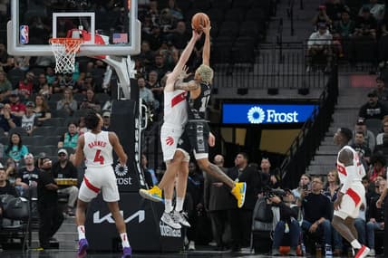 Nov 5, 2023; San Antonio, Texas, USA;  Toronto Raptors center Jakob Poeltl (19) blocks a shot by San Antonio Spurs forward Jeremy Sochan (10) in the first half at the Frost Bank Center. Mandatory Credit: Daniel Dunn-USA TODAY Sports
