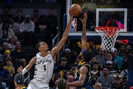 Nov 6, 2023; Indianapolis, Indiana, USA; San Antonio Spurs center Victor Wembanyama (1) shoots the ball while Indiana Pacers forward Isaiah Jackson (22) defends in the first half at Gainbridge Fieldhouse. Mandatory Credit: Trevor Ruszkowski-USA TODAY Sports