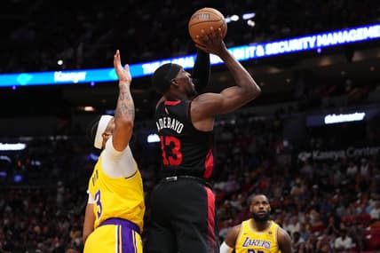 Nov 6, 2023; Miami, Florida, USA; Miami Heat center Bam Adebayo (13) puts up a shot against the Los Angeles Lakers during the first half at Kaseya Center. Mandatory Credit: Jasen Vinlove-USA TODAY Sports