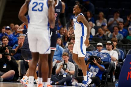 Memphis' Jaykwon Walton (10) celebrates after dunking the ball during the season opener between the University of Memphis and Jackson State University at FedExForum in Memphis, Tenn., on Monday, November 6, 2023.