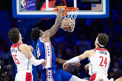 Nov 6, 2023; Philadelphia, Pennsylvania, USA; Philadelphia 76ers center Joel Embiid (21) dunks the ball past Washington Wizards center Mike Muscala (35) and forward Corey Kispert (24) during the third quarter at Wells Fargo Center. Mandatory Credit: Bill Streicher-USA TODAY Sports