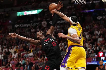 Nov 6, 2023; Miami, Florida, USA; Los Angeles Lakers forward Anthony Davis (3) fouls Miami Heat center Bam Adebayo (13) during the first half at Kaseya Center. Mandatory Credit: Jasen Vinlove-USA TODAY Sports