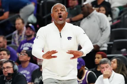 Nov 6, 2023; Las Vegas, Nevada, USA; Kansas State Wildcats head coach Jerome Tang talks to a player before the USC Trojans inbound the ball during the second half at T-Mobile Arena. Mandatory Credit: Stephen R. Sylvanie-USA TODAY Sports