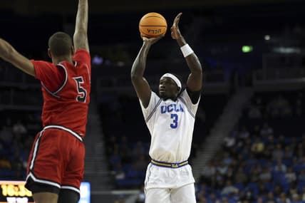 Nov 6, 2023; Los Angeles, California, USA;  UCLA Bruins forward Adem Bona (3) shoots against St. Francis (Pa) Red Flash forward Eli Wilborn (5) during the first half at Pauley Pavilion presented by Wescom. Mandatory Credit: Kiyoshi Mio-USA TODAY Sports