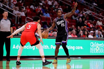 Nov 6, 2023; Houston, Texas, USA; Sacramento Kings guard Davion Mitchell (15) handles the ball against Houston Rockets guard Fred VanVleet (5) during the third quarter at Toyota Center. Mandatory Credit: Erik Williams-USA TODAY Sports