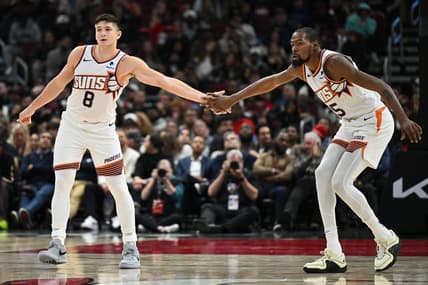 Nov 8, 2023; Chicago, Illinois, USA; Phoenix Suns forward Kevin Durant (35), right, congratulates guard Grayson Allen (8) after Allen hit a three-point shot in the second half against the Chicago Bulls at United Center. Mandatory Credit: Jamie Sabau-USA TODAY Sports