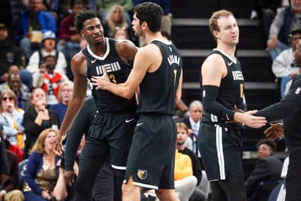 Nov 10, 2023; Memphis, Tennessee, USA; Memphis Grizzlies forward-center Jaren Jackson Jr. (13) held back by forward-center Santi Aldama (7) after being called for two technical fouls during the second half against the Utah Jazz at FedExForum. Mandatory Credit: Petre Thomas-USA TODAY Sports