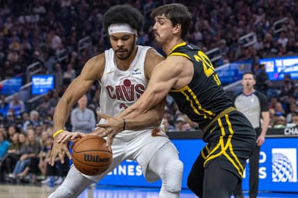 Nov 11, 2023; San Francisco, California, USA;  Golden State Warriors forward Dario Saric (20) defends against Cleveland Cavaliers center Jarrett Allen (31) during the first quarter at Chase Center. Mandatory Credit: Neville E. Guard-USA TODAY Sports