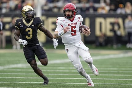 Nov 11, 2023; Winston-Salem, North Carolina, USA; Wake Forest Demon Deacons defensive back Malik Mustapha (3) chases North Carolina State Wolfpack quarterback Brennan Armstrong (5) during the first half at Allegacy Federal Credit Union Stadium. Mandatory Credit: Jim Dedmon-USA TODAY Sports