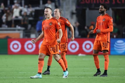 Nov 11, 2023; Houston, Texas, USA; Houston Dynamo defender Erik Sviatchenko (28), midfielder Griffin Dorsey (25), and defender Micael (31) react after the game against Real Salt Lake at Shell Energy Stadium. Mandatory Credit: Troy Taormina-USA TODAY Sports
