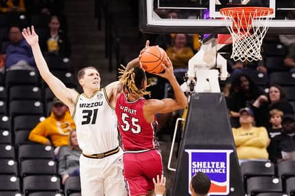 Nov 13, 2023; Columbia, Missouri, USA; SIU Edwardsville Cougars forward Lamar Wright (55) shoots as Missouri Tigers guard Caleb Grill (31) defends during the first half at Mizzou Arena. Mandatory Credit: Denny Medley-USA TODAY Sports