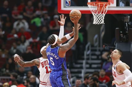 Nov 15, 2023; Chicago, Illinois, USA; Orlando Magic forward Paolo Banchero (5) shoots against Chicago Bulls forward Torrey Craig (13) during the first half at United Center. Mandatory Credit: Kamil Krzaczynski-USA TODAY Sports