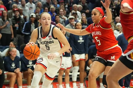 Nov 16, 2023; Storrs, Connecticut, USA; Connecticut Huskies guard Paige Bueckers (5) drives the ball toward the basket against Maryland Terrapins guard Brinae Alexander (5) during the second half at Harry A. Gampel Pavilion. Mandatory Credit: Gregory Fisher-USA TODAY Sports