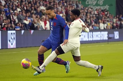 Nov 16, 2023; Austin, Texas, USA; U.S. Men's National team defender Sergino Dest (2) and Trinidad and Tobago defender Andre Raymond (6) battle for the ball during the first half in the Concacaf Quarterfinal at Q2 Stadium. Mandatory Credit: Scott Wachter-USA TODAY Sports