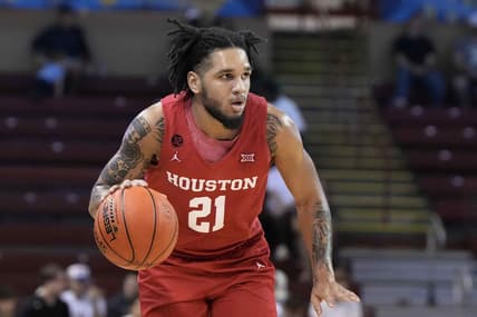 Nov 17, 2023; Charleston, SC, USA; Houston Cougars guard Emanuel Sharp (21) brings the ball up court in the first half against the Utah Utes at TD Arena. Mandatory Credit: David Yeazell-USA TODAY Sports