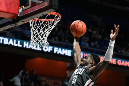 Nov 18, 2023; Uncasville, CT, USA; Washington State Cougars guard Kymany Houinsou (31) rebounds the ball during the second half against Mississippi State Bulldogs at Mohegan Sun Arena. Mandatory Credit: Mark Smith-USA TODAY Sports