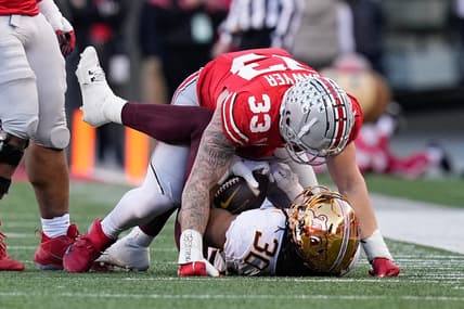 Nov 18, 2023; Columbus, Ohio, USA; Ohio State Buckeyes defensive end Jack Sawyer (33) tackles Minnesota Golden Gophers running back Jordan Nubin (30) during the first half of the NCAA football game at Ohio Stadium.