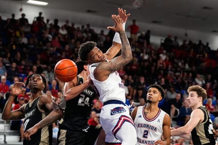 Nov 18, 2023; Boca Raton, Florida, USA; Florida Atlantic Owls guard Alijah Martin (15) attempts to grab a rebound against the Bryant University Bulldogs during the first half at Eleanor R. Baldwin Arena. Mandatory Credit: Rich Storry-USA TODAY Sports