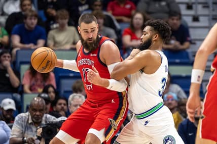 Nov 18, 2023; New Orleans, Louisiana, USA; New Orleans Pelicans center Jonas Valanciunas (17) fights for position against Minnesota Timberwolves center Karl-Anthony Towns (32) during the first half at the Smoothie King Center. Mandatory Credit: Stephen Lew-USA TODAY Sports