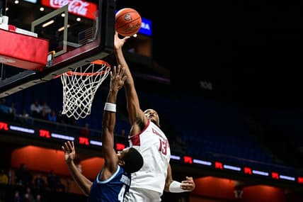 Nov 19, 2023; Uncasville, CT, USA; Washington State Cougars forward Isaac Jones (13) blocks a sot by Rhode Island Rams guard Cam Estevez (4) during the first half at Mohegan Sun Arena. Mandatory Credit: Mark Smith-USA TODAY Sports