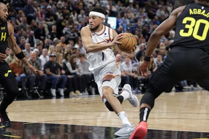 Nov 19, 2023; Salt Lake City, Utah, USA;  Phoenix Suns guard Devin Booker (1) drives to the basket during the second quarter against the Utah Jazz at Delta Center. Mandatory Credit: Chris Nicoll-USA TODAY Sports