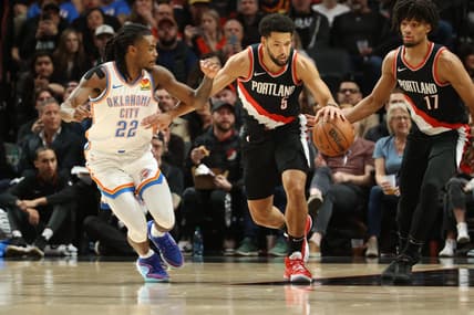 Nov 19, 2023; Portland, Oregon, USA;  Portland Trail Blazers guard Skylar Mays (5) dribbles up the court past Oklahoma City Thunder guard Cason Wallace (22) in the first half at Moda Center. Mandatory Credit: Jaime Valdez-USA TODAY Sports