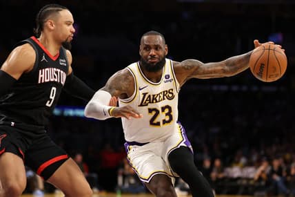 Nov 19, 2023; Los Angeles, California, USA;  Los Angeles Lakers forward LeBron James (23) dribbles against Houston Rockets forward Dillon Brooks (9) during the second quarter at Crypto.com Arena. Mandatory Credit: Kiyoshi Mio-USA TODAY Sports