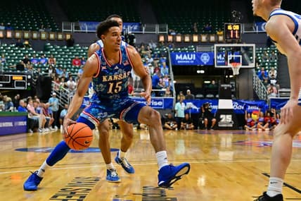 Nov 20, 2023; Honolulu, Hawaii, USA;  Kansas Jayhawks guard Kevin McCullar Jr. (15) drives to the basket against Chaminade Silverswords forward Scott Ator (24) during the first period at SimpliFi Arena at Stan Sheriff Center. Mandatory Credit: Steven Erler-USA TODAY Sports