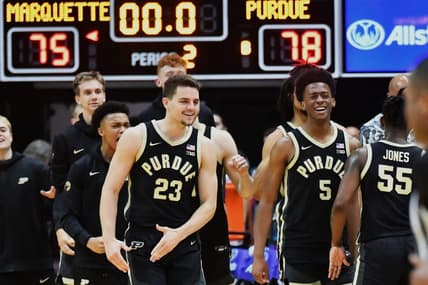 Nov 22, 2023; Honolulu, HI, USA; Purdue Boilermakers forward Camden Heide (23) and guard Myles Colvin (5) celebrate as time expired to defeat the Marquette Golden Eagles 78-75 at SimpliFi Arena at Stan Sheriff Center. Mandatory Credit: Steven Erler-USA TODAY Sports